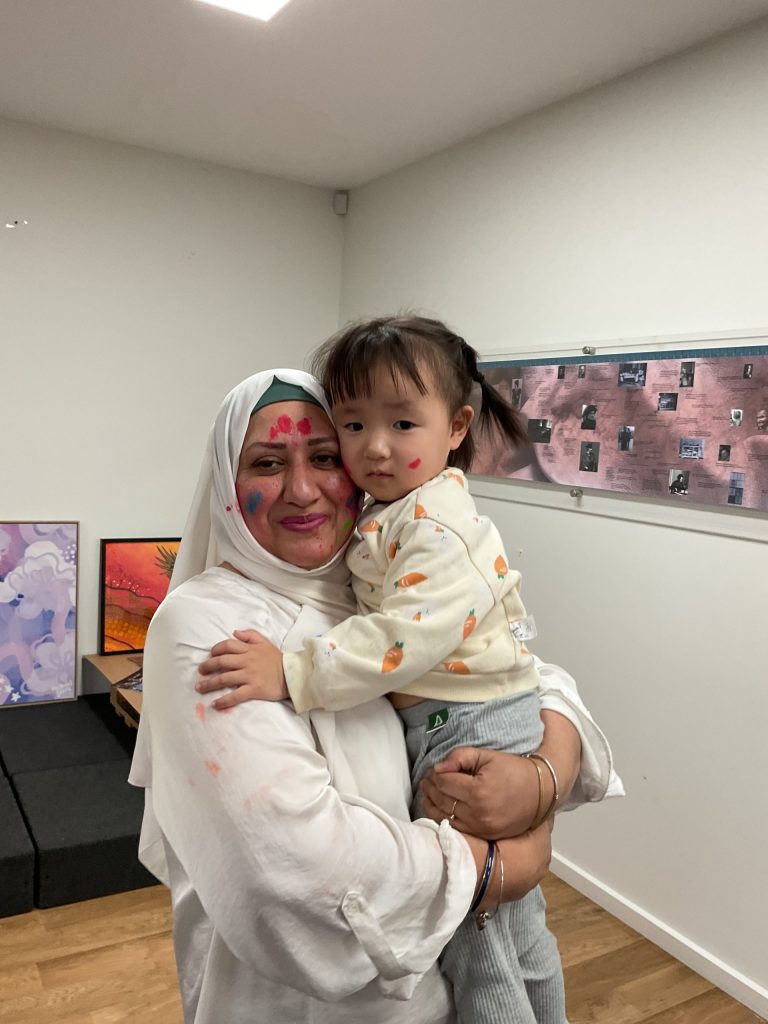 Holi celebration childcare activity with children learning colours